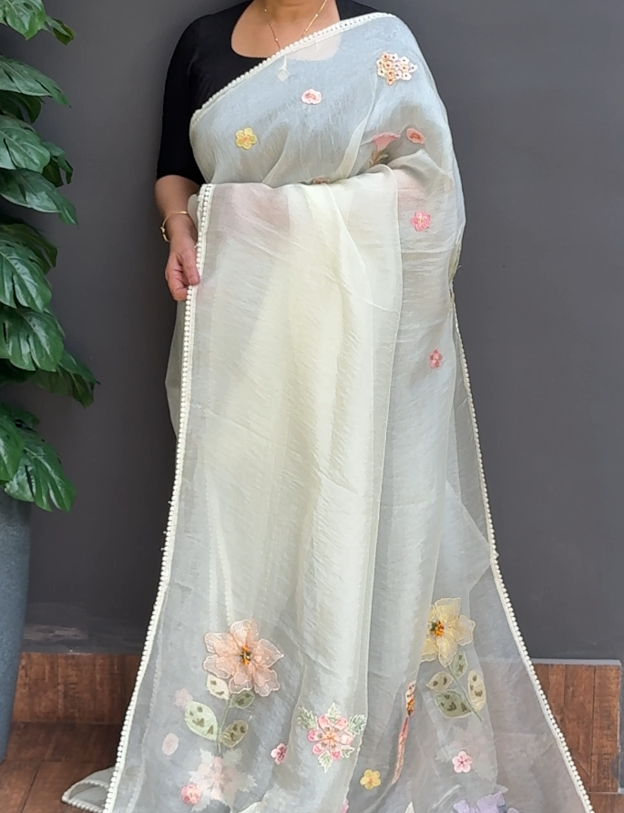 1755SR06 | Ivory Cream Glass Organza Saree W/ Full Body Floral Applique Work W/ Crochet Lace Border & Pallu