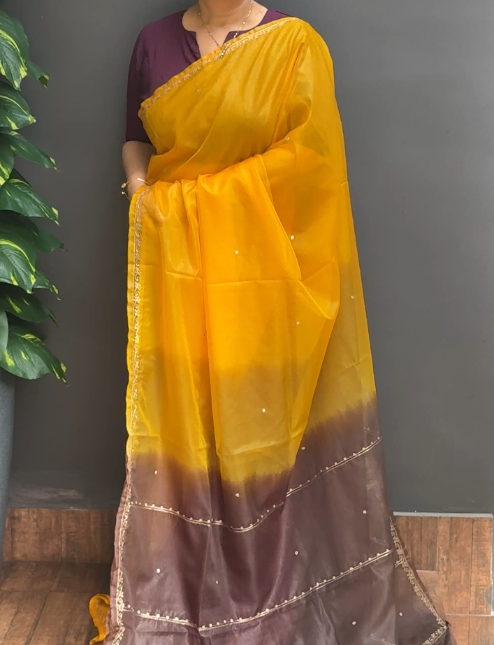 1974SR06 | Haldi Yellow With Brown Organza Saree W/ Full Body Zari Woven Butti Work W/ Chain Stitch Border & Pallu