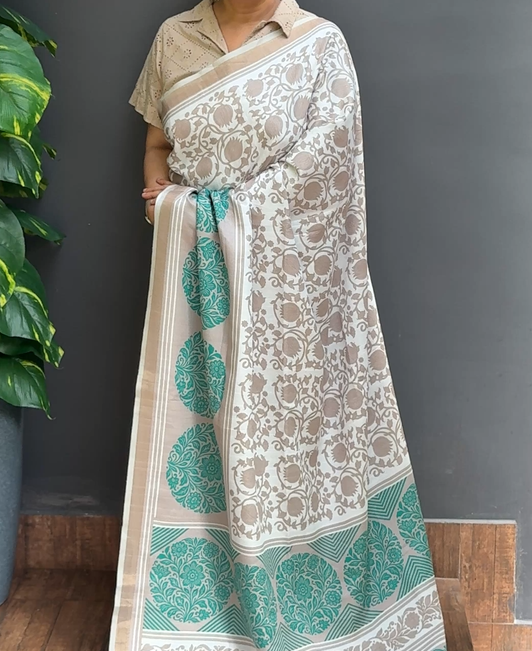 2109SR04 | Chikku Blended Beige With Off-White Soft Semi Silk Saree W/ Full Body Floral Pattern W/ Border & Pallu