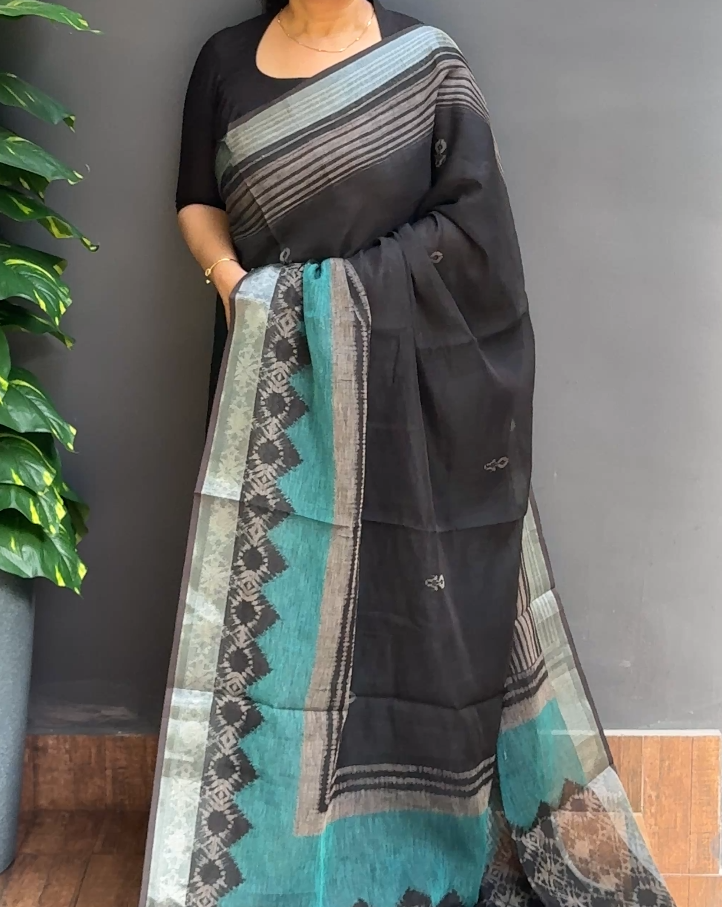 2128SR02 | Black Soft Semi Chanderi Saree W/ Full Body Ikkath Design W/ Border & Pallu